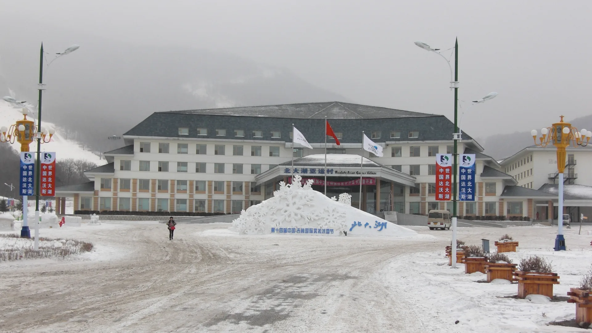 Ski slopes and gondola at a snowy mountain resort (illustration)